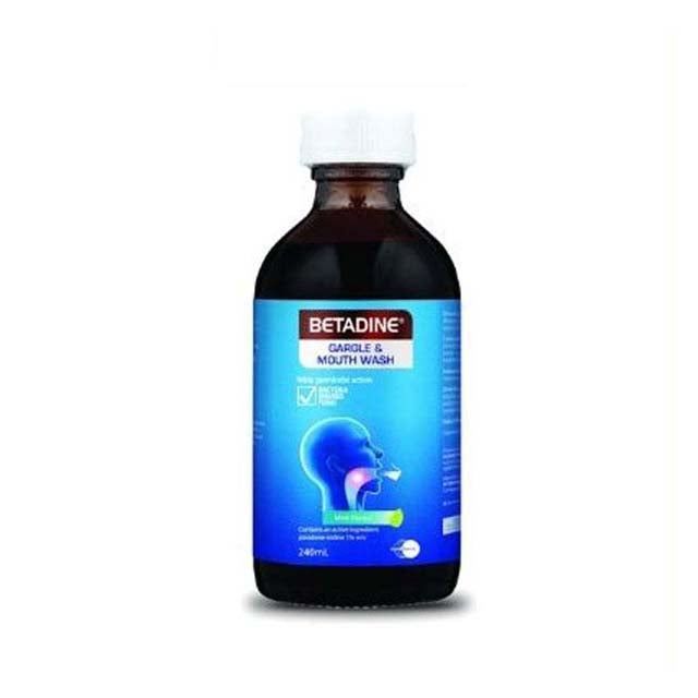 Betadine gargle and mouth wash 240ml bottle with blue labeling for effective oral care