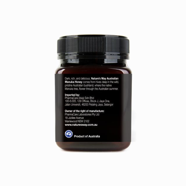 Natures Way Australian Manuka honey MGO 100+ in a dark jar with label showcasing its rich flavor