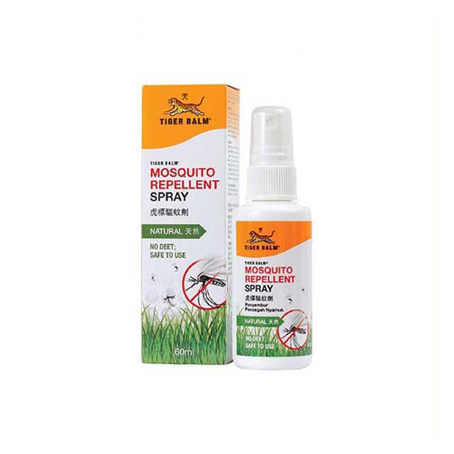 Tiger Balm mosquito repellent spray in a white bottle with a green box, effective and safe for outdoor use