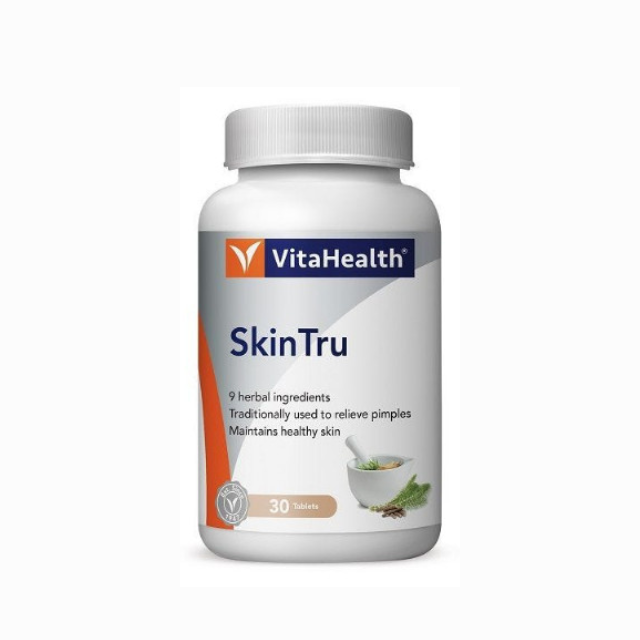 VitaHealth Skin Tru supplement bottle with 30 tablets for maintaining healthy skin and relieving pimples