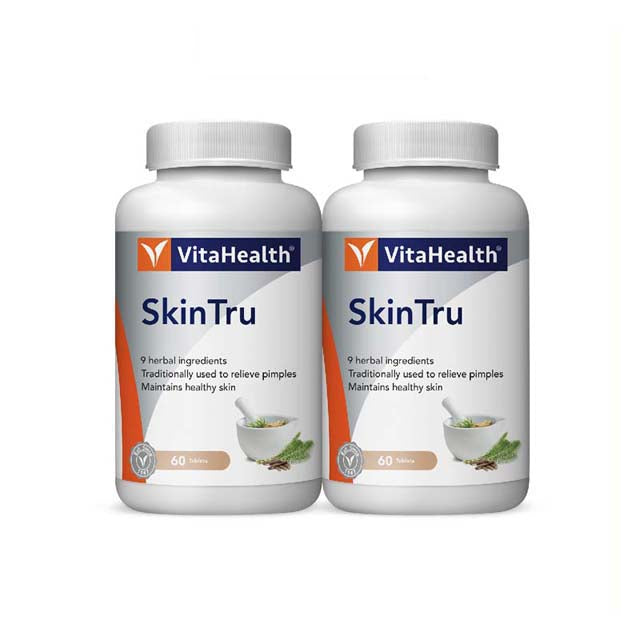 VitaHealth SkinTru supplement bottles with herbal ingredients for maintaining healthy skin